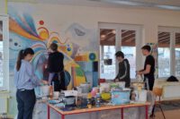 viele Hände, schöne Wände